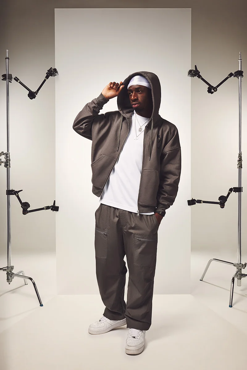 Image of Tobi wearing the Initial Box Zip Hoodie in Phantom Grey
