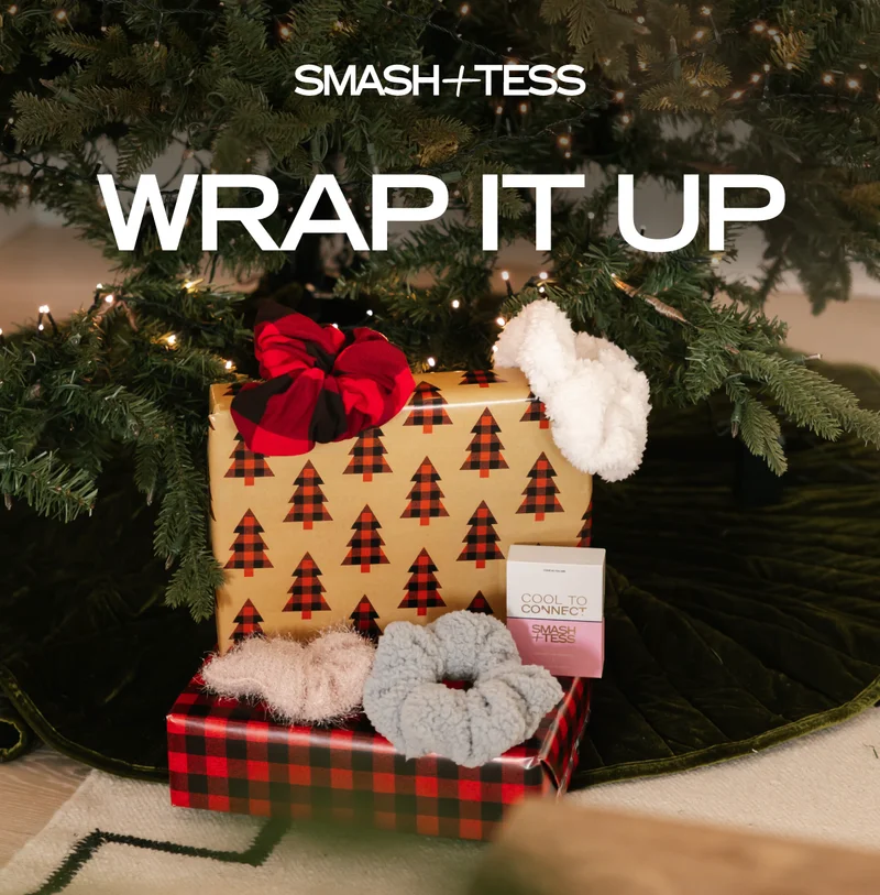 presents under a christmas tree with text 'wrap it up'