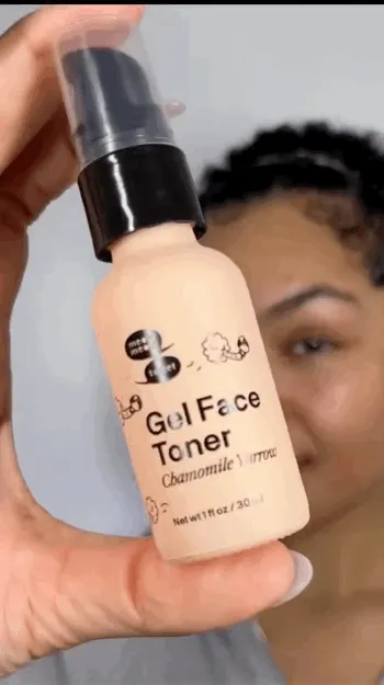 A person (Trinity) with cropped dark curly hair, brown skin, and light pink nails opens a pink box and pulls out a pink bottle of gel toner. Trinity pumps the toner onto their hands and then apply to their face.