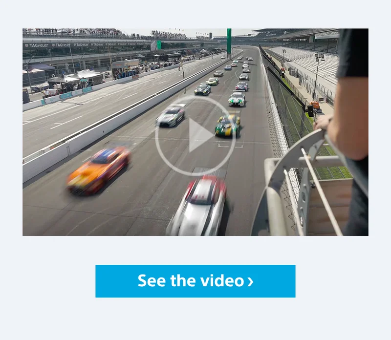A still image overlooking a racing track. See the video