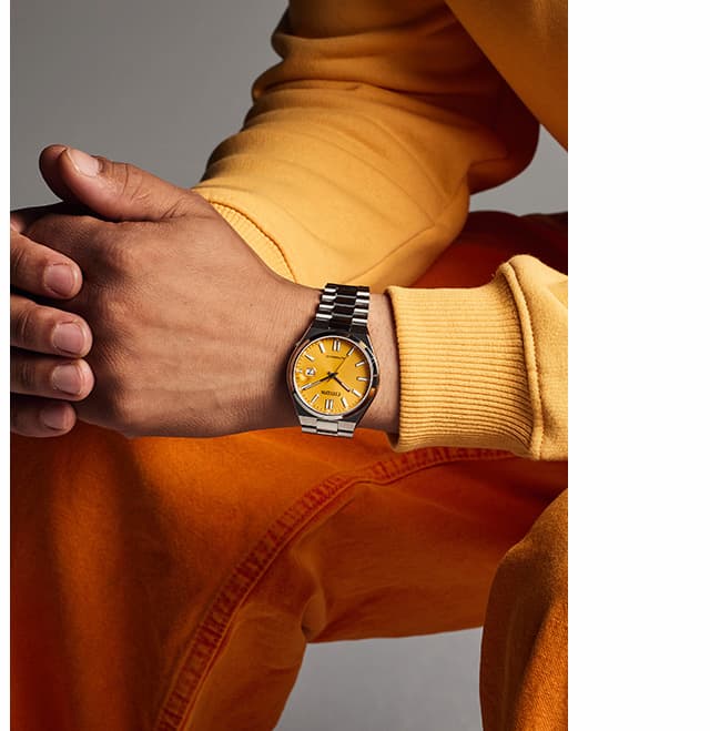 Man wearing the yellow dial TSUYOSA