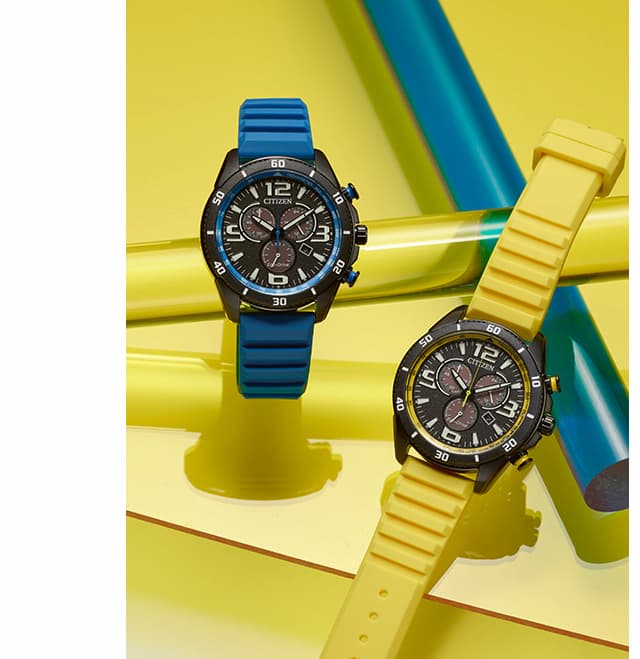 Close up the blue and yellow strap Brycen chronographs on a tabletop.