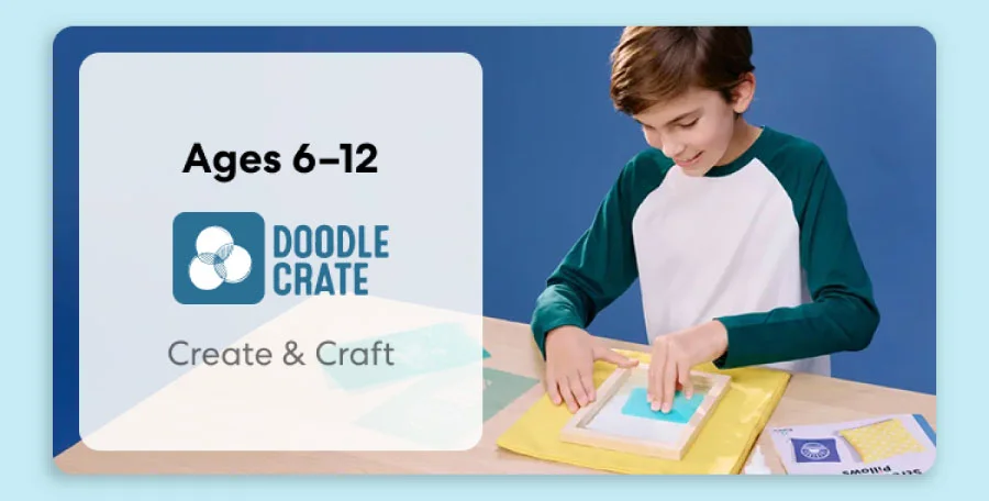 Smiling child holding a colorful KiwiCo art and design project. Inspires creativity for ages 6–12
