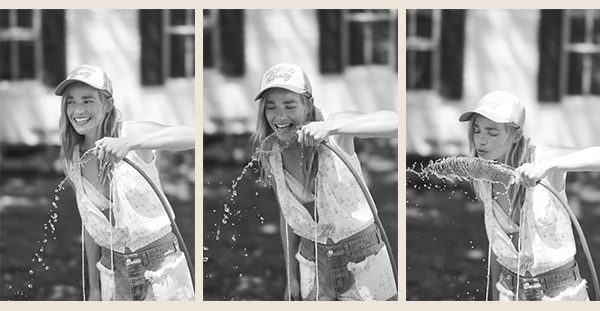 Girl drinking from a hose