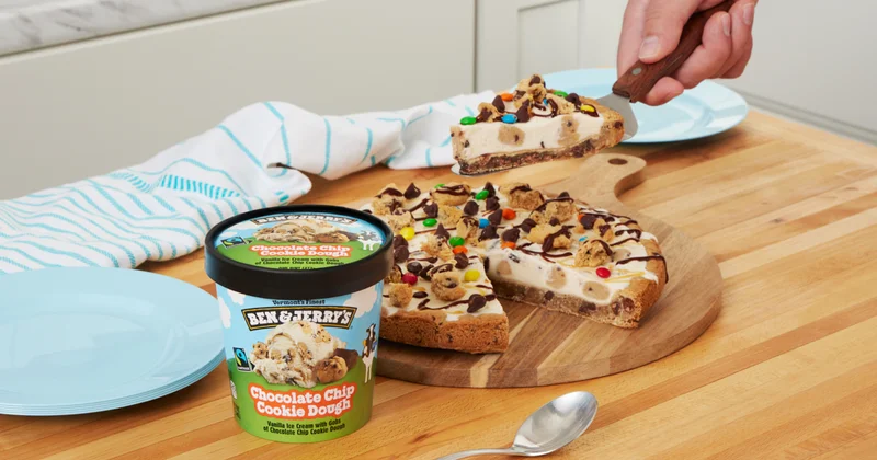 Ben & Jerry's Chocolate Chip Cookie Dough ice cream pint next to a cookie pizza made with ice cream and toppings.