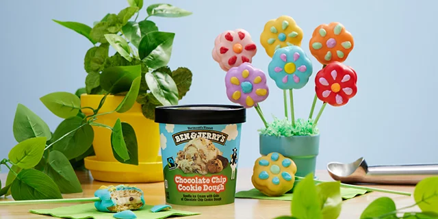 Ben & Jerry's Chocolate Chip Cookie dough ice cream and a flower pot with decorated ice cream flower-wiches.