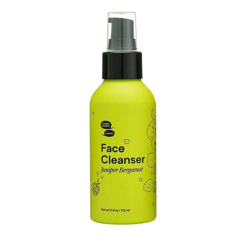 A green bottle of cleanser with a black pump.