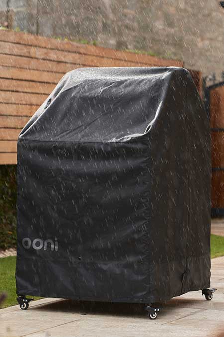 Our Ooni oven and table cover being put to use in the rain