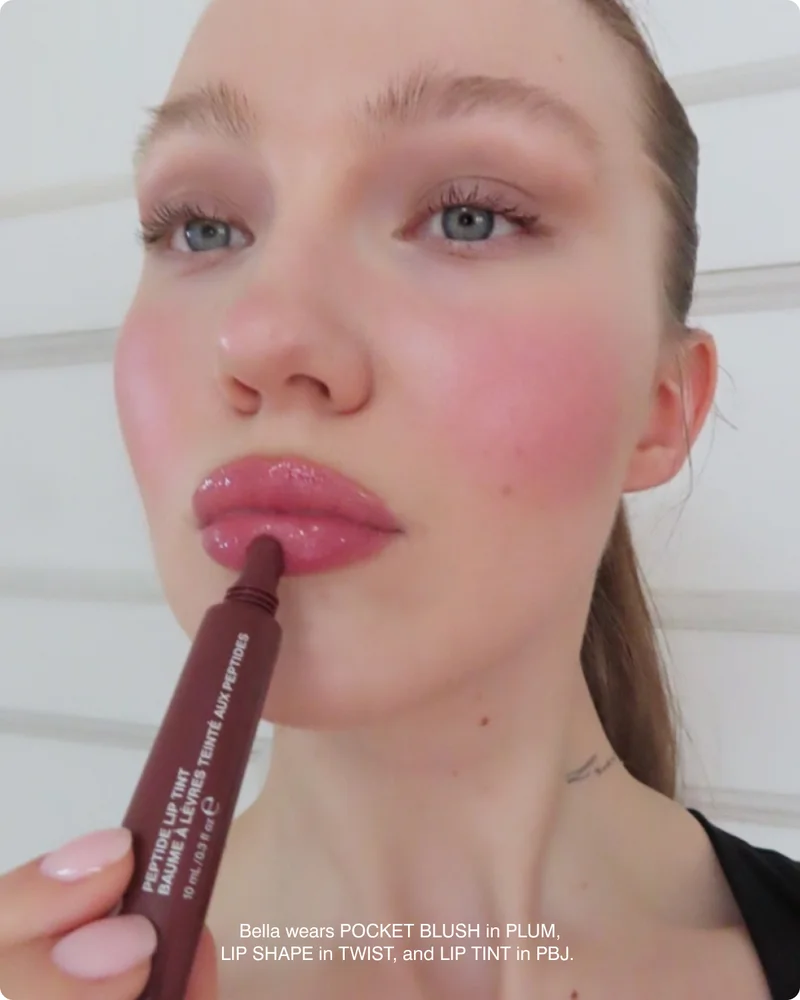 Bella wears POCKET BLUSH in PLUM, LIP SHAPE in TWIST, and LIP TINT in PBJ