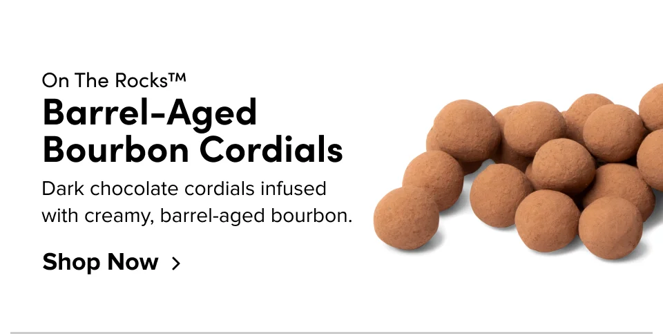 On The Rocks; Barrel-Aged Bourbon Cordials; Dark chocolate cordials infused with creamy, barrel-aged bourbon. Shop Now