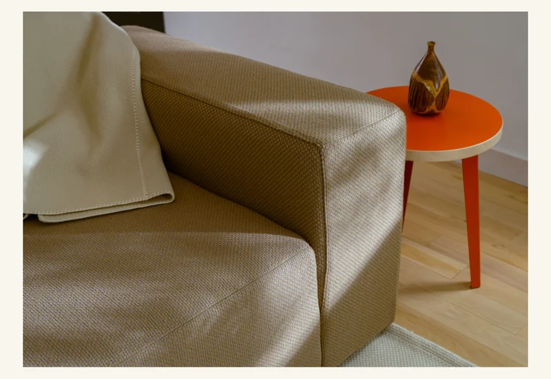 Pictured: The Form Sectional in Sisu (Grey/Tan) and The Side Table