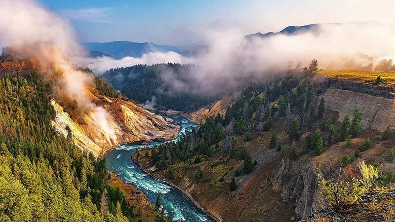 Image description: Aerial view of Calcite Springs and the Yellowstone River in Yellowstone National Park