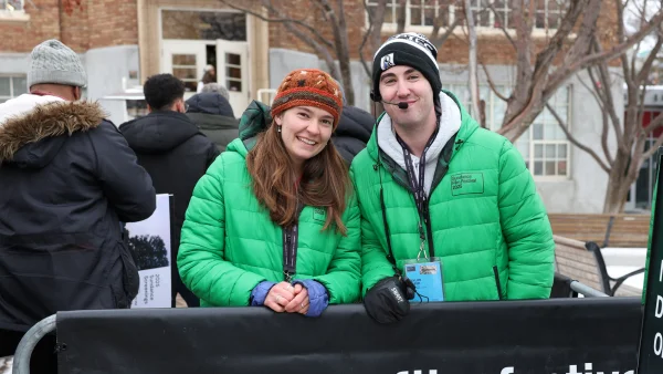 Two volunteers work at an entry line in Park City.