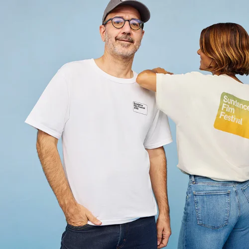 Model wears SFF25 Champion Box tee in white.