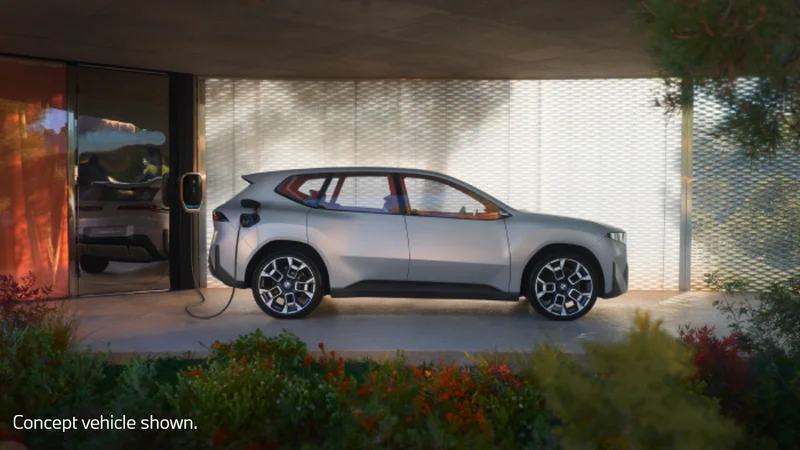 Neue Klasse X parked and plugged in for charging. Concept vehicle shown.