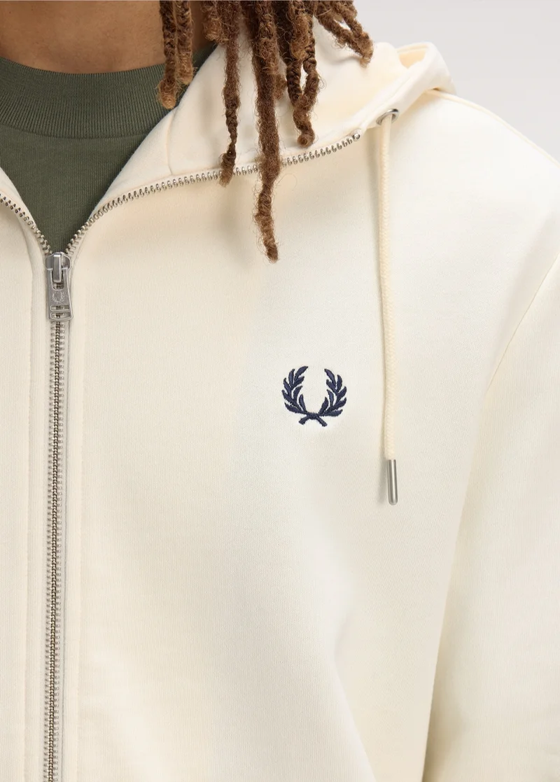 New Releases: Close up of a Fred Perry Hooded Zip Through Sweatshirt in Ecru / Dusky Blue / French Navy