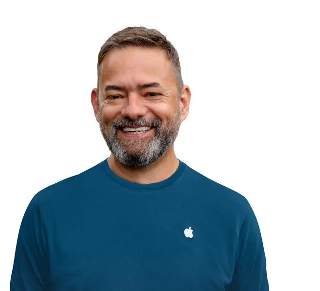 Headshot photo of a smiling Apple Store Specialist