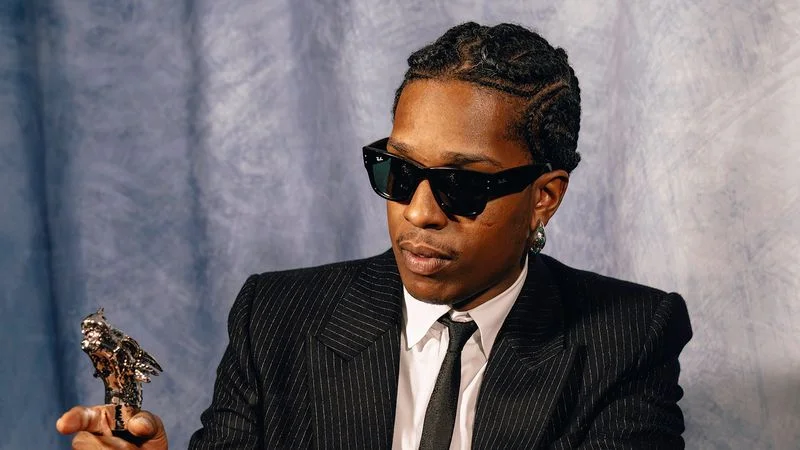 Image may contain: A$AP Rocky, Clothing, Formal Wear, Suit, Blazer, Coat, Jacket, Accessories, Glasses, Jewelry, and Ring Image may contain: A$AP Rocky, Clothing, Formal Wear, Suit, Blazer, Coat, Jacket, Accessories, Glasses, Jewelry, and Ring