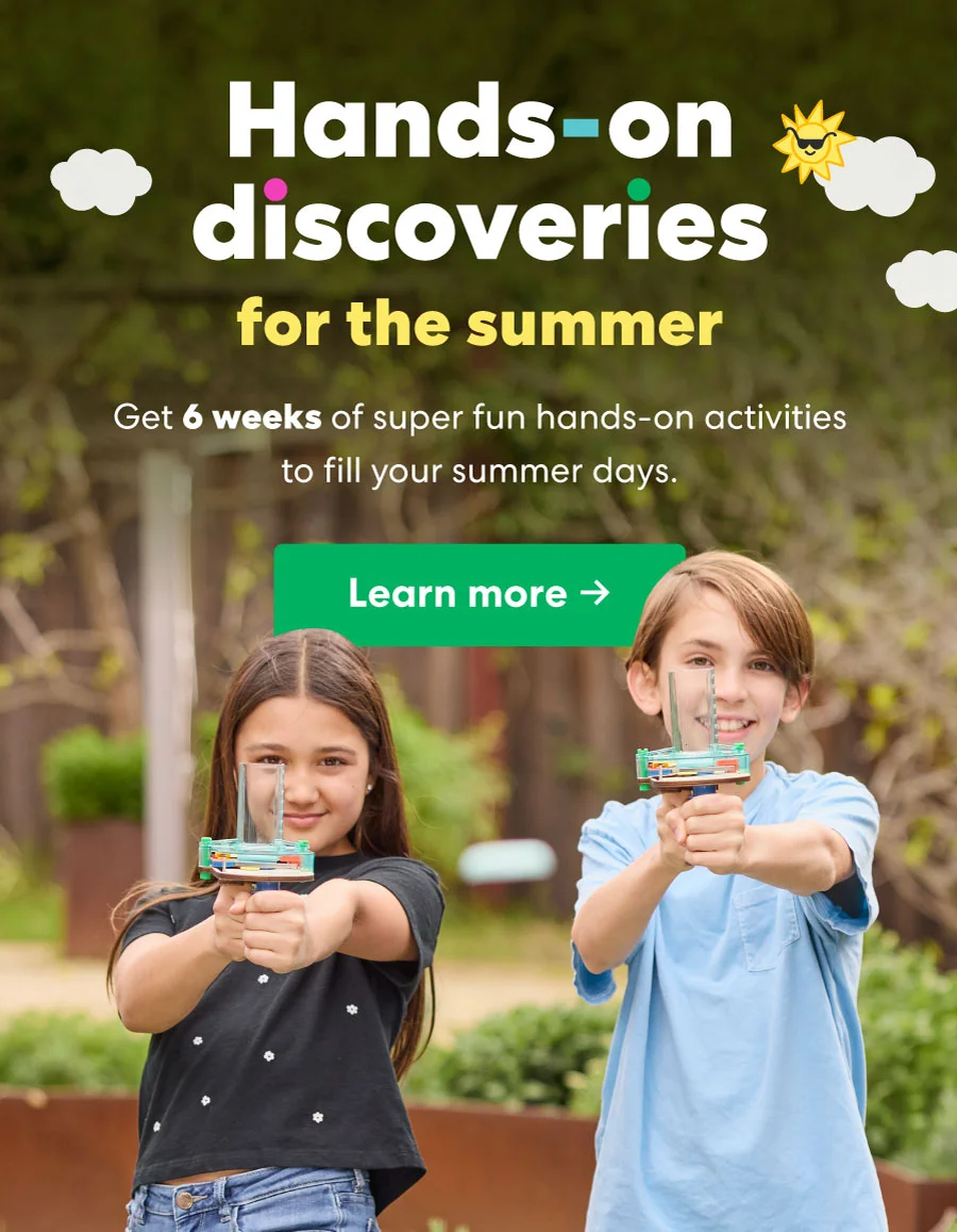 Two kids play with summer STEM kits outdoors, promoting hands-on discoveries for the summer.