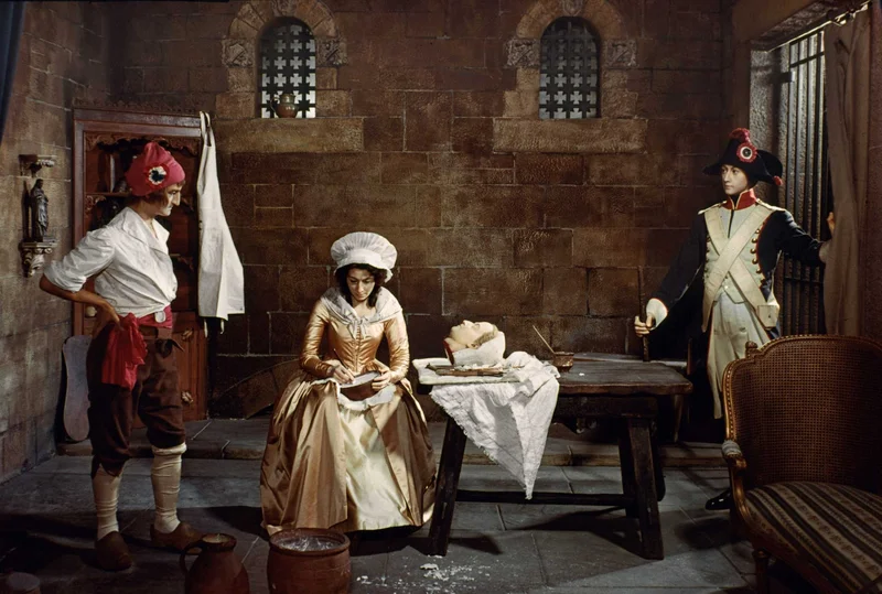 Marie prepares a death mask from a severed head during the Reign of Terror. Madame Tussauds, London