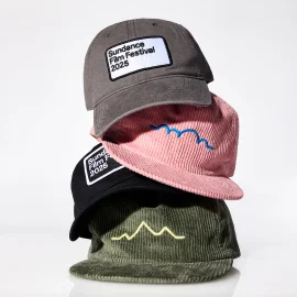 A stack of four Sundance Film Festival 2025 hats