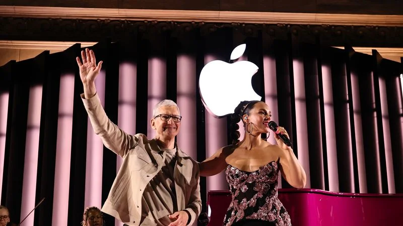 Apple's Tim Cook with Alicia Keys at