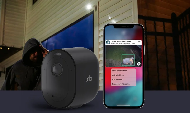 Arlo Pro 5S 2K Wireless Security Camera next to a phone displaying a simulated screen image of an Arlo Secure notification with animated preview.
