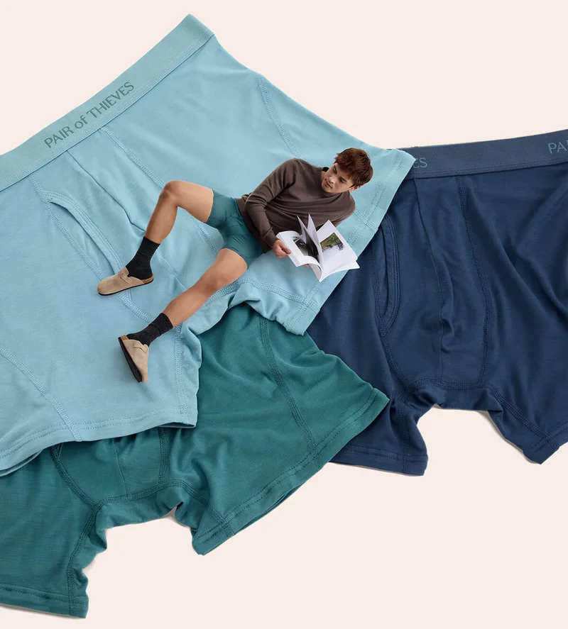 Model laying on rayon made from bamboo boxer briefs