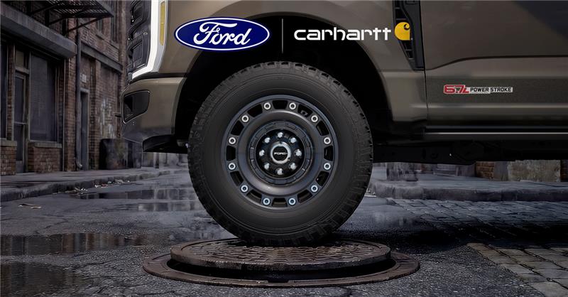 Close‑up of a Super Duty® Carhartt® Special Edition Package wheel. The Ford and Carhartt logos are above.