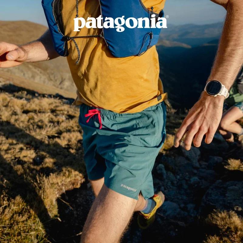 Patagonia. People running up a mountain.