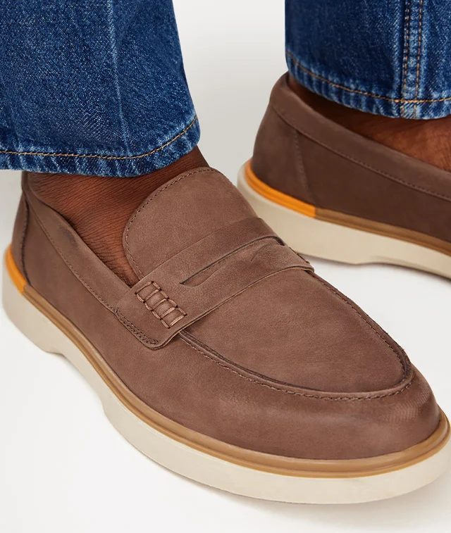 Close up of Leo penny loafer in brown nubuck leather. Shop men's shoes.
