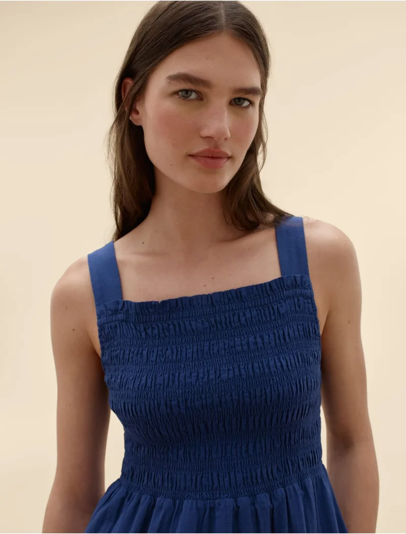 [Editorial Image] Model in The Gauze Smock Dress | Mazarine Blue