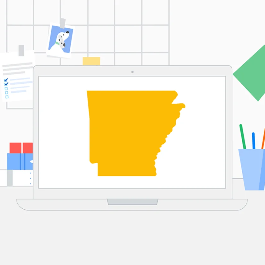 Stylized illustration of a laptop displaying a yellow map of Arkansas, surrounded by office items including a dog photo, papers, and a pen cup.
