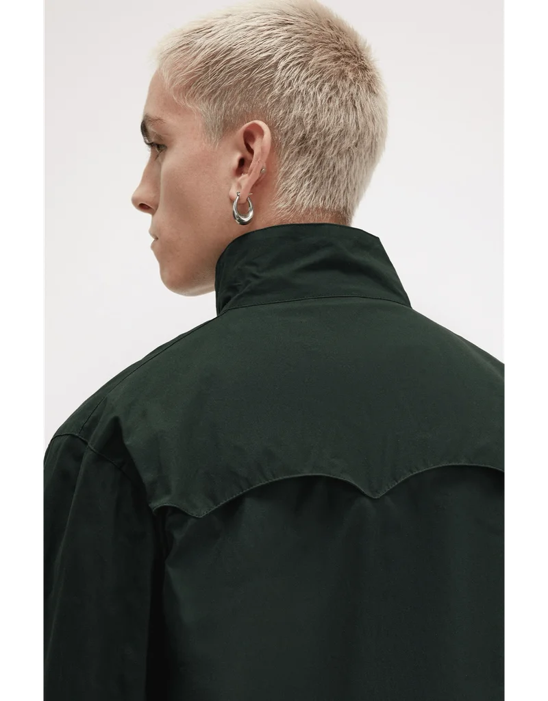 Male model wearing a lightweight Fred Perry Jacket