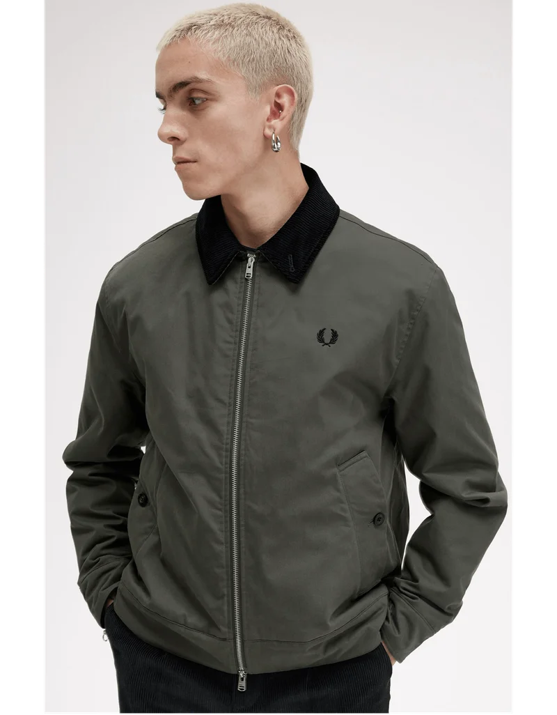 Male model wearing a lightweight Fred Perry Jacket