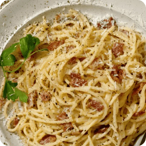 a plate of pasta carbonara a plate of pasta carbonara