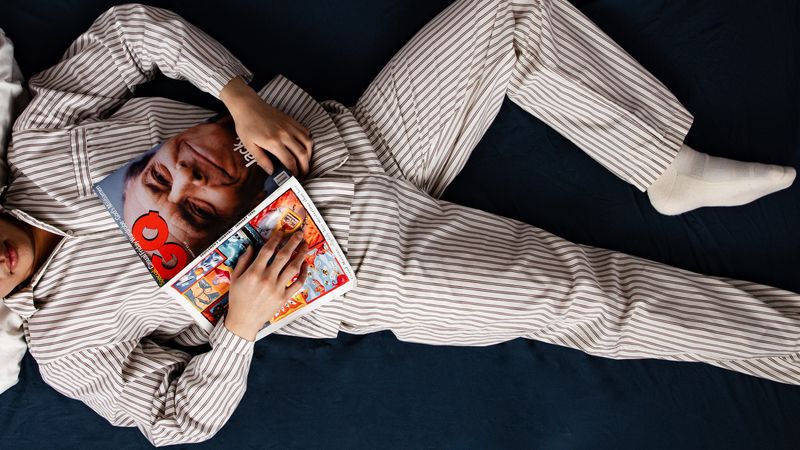 Image may contain: Jack Nicholson, Book, Publication, Clothing, Hosiery, Sock, Adult, and Person