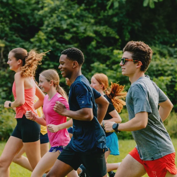 Group of people running together