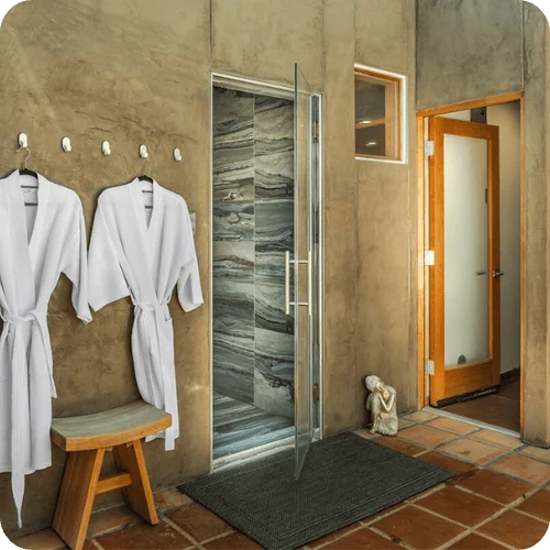 a romantic airbnb with a spa and robes handing on hooks a romantic airbnb with a spa and robes handing on hooks
