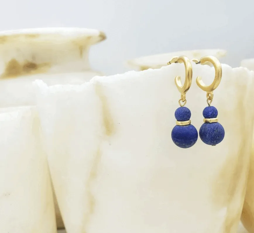 A GIF of earrings, rings, and bracelets