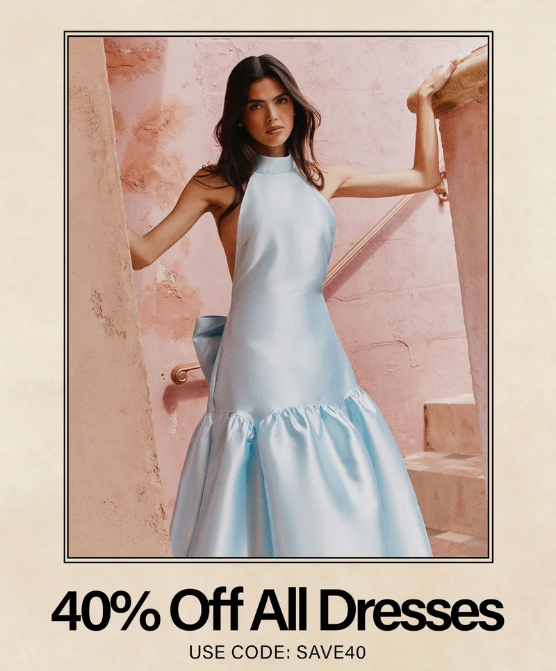 Light blue halter neck gown on woman. Get 40% off all dresses & gowns with code discount code.