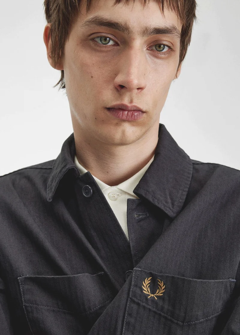 Man wearing Anchor Grey Herringbone Overshirt