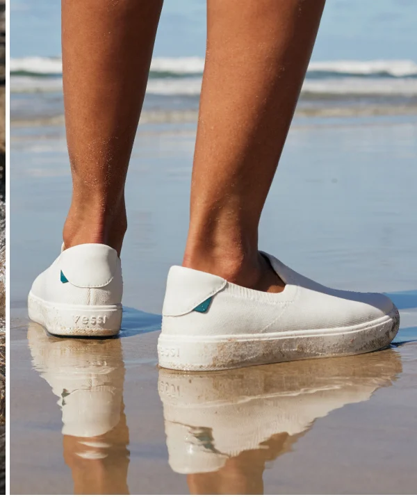 Graphic of someone wearing their Boardwalk Slip-Ons in Sail White.