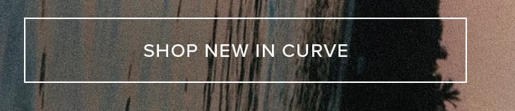 White "SHOP NEW IN CURVE" button over a dark, textured background resembling rippling water and a faint palm silhouette. Shop new arrivals in plus size fashion.