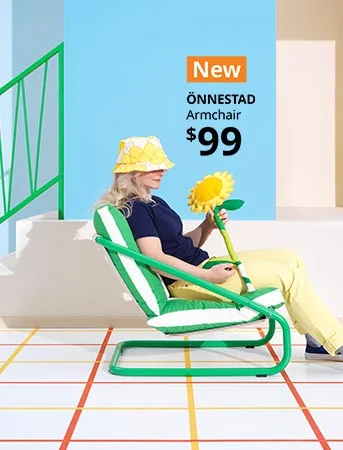 Green and white striped armchair