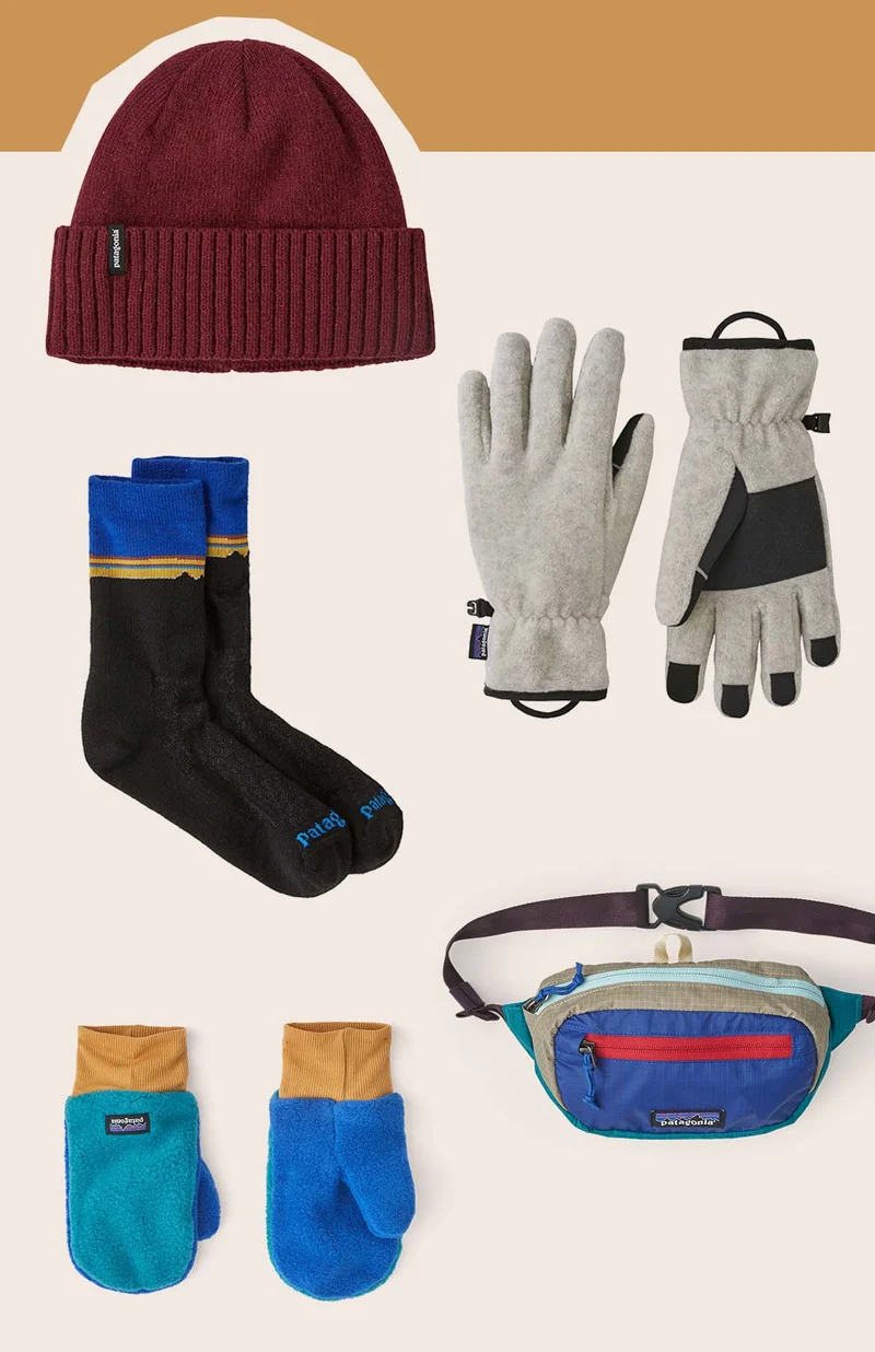 An assortment of small gifts like beanies, socks, gloves and more.