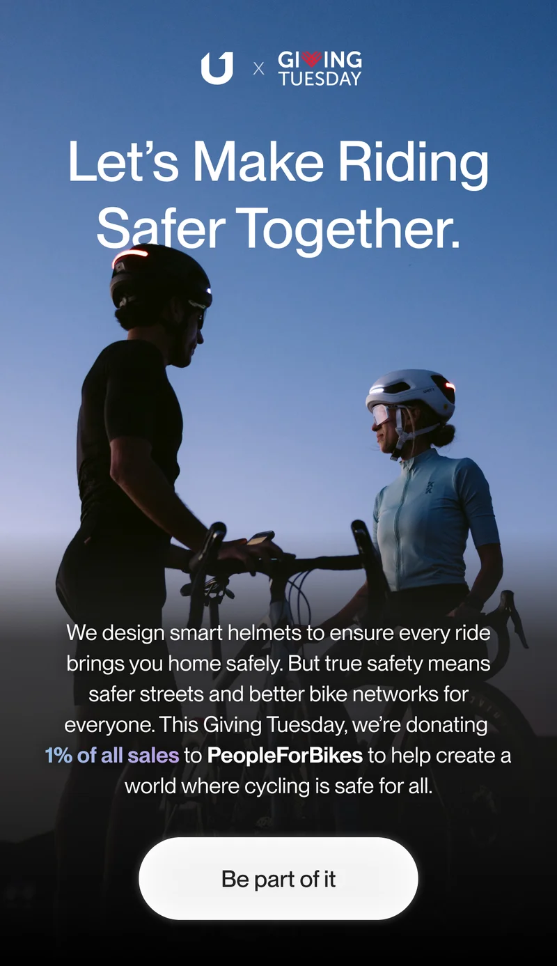 Cyclists wearing UNIT 1 helmets at sunset, supporting Giving Tuesday with safer roads for all.