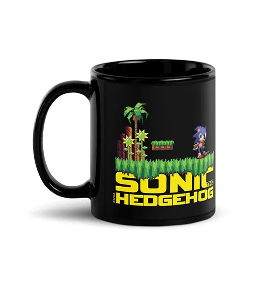 Black mug featuring a pixelated Sonic the Hedgehog game scene and the words 'Sonic the Hedgehog'.