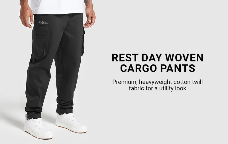 Rest Day Woven Cargo Pants - black. Premium, heavyweight cotton twill fabric for a utility look.