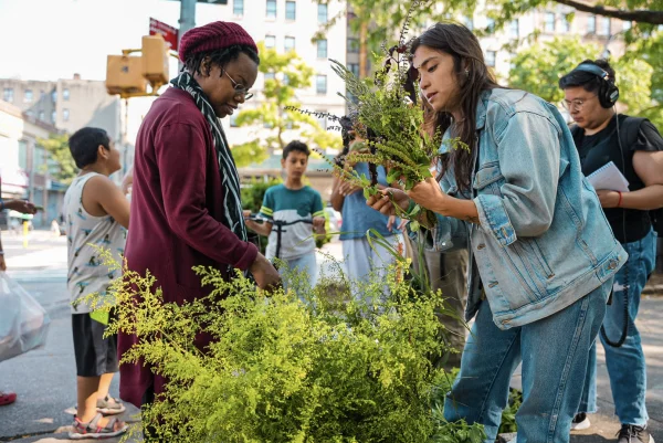 A photograph of people gardening